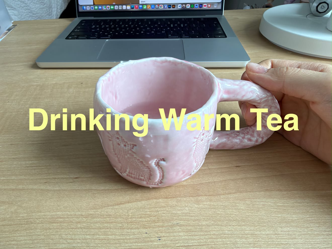 The participant making warm tea